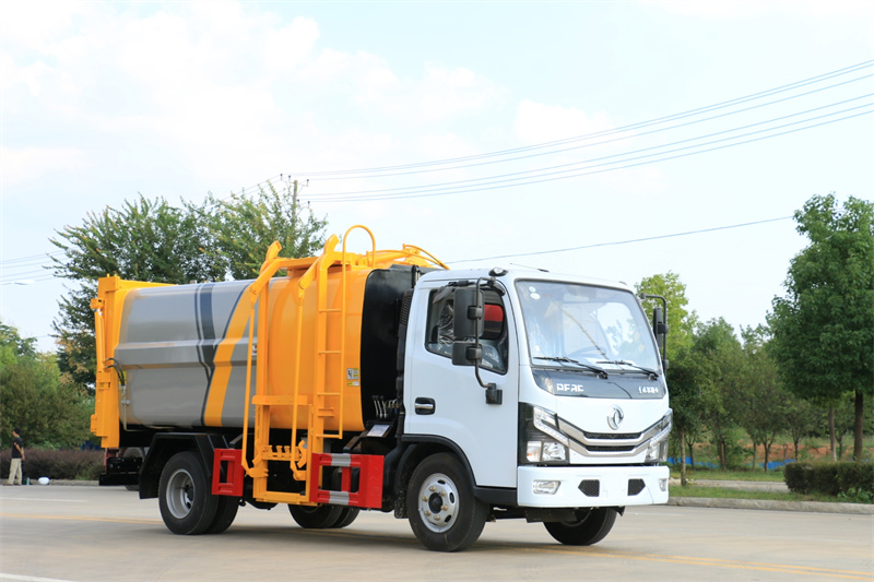 東風(fēng)藍(lán)牌7方掛桶壓縮垃圾車(chē)